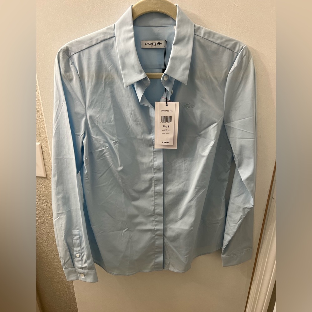 TWO Izod Lacoste button downs. Size 40/8. One shirt new w/tags. Both never worn.
